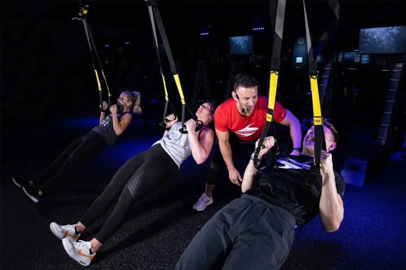 A full TRX class in session on the Bria Method studio floor